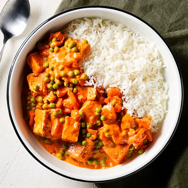 Romige curry met tuinerwtjes en paneer