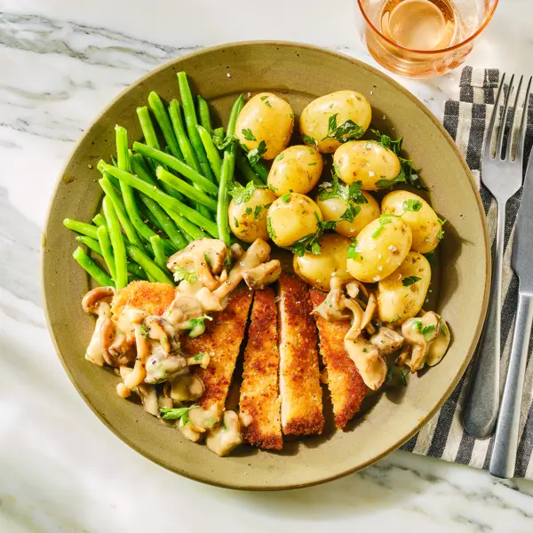 Schnitzel met paddenstoelensaus en krieltjes