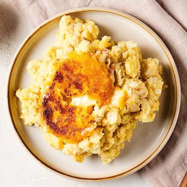 Bloemkoolstamppot met kaasschnitzel