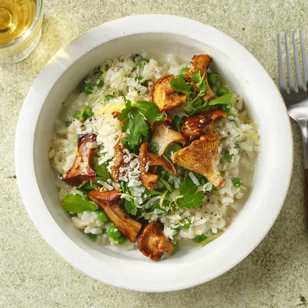 Risotto met paddenstoelen en erwten