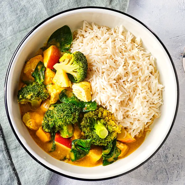 Gele curry met appel en kip