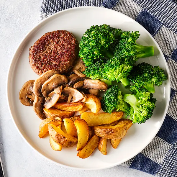 Rundertartaartjes met gebakken champignons