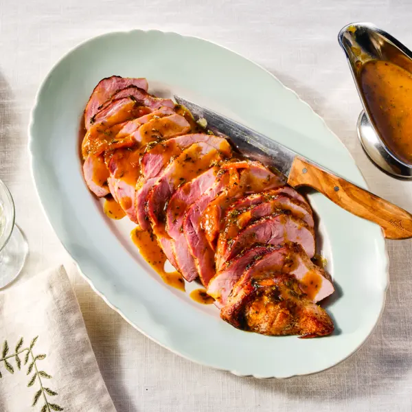 Geroosterde beenham met sinaasappelglaze
