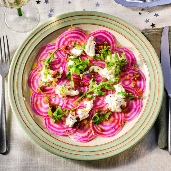 Chioggia carpaccio met glazed pijnboompitten