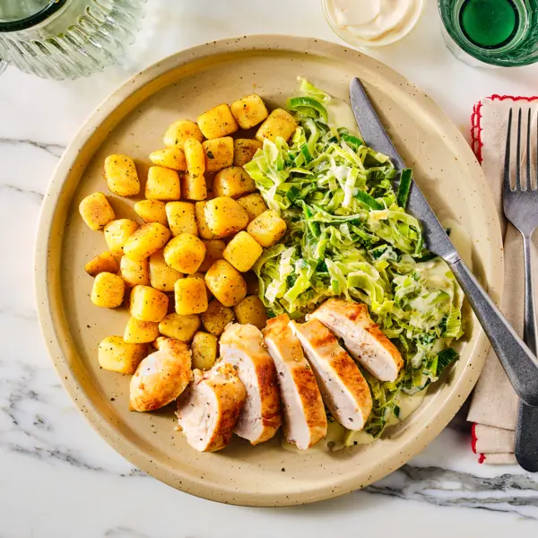 Kruidenboterkrieltjes met kip en prei à la crème