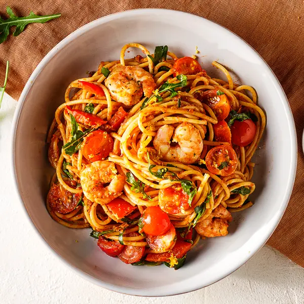 Spaghetti met zongedroogde tomaatjes en garnalen