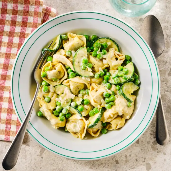 Prosciutto tortellini met boursin en doperwtjes
