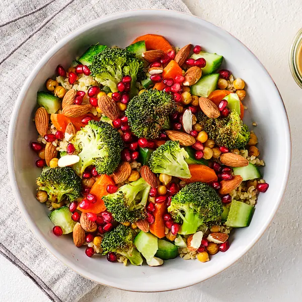 Bulgursalade met granaatappel en tahini