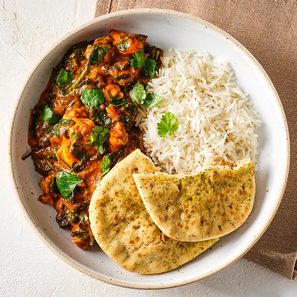 Kip tikka masala met rijst en naan