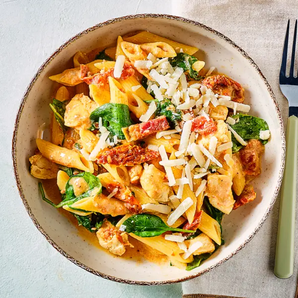 Penne met romige spinazie en kip
