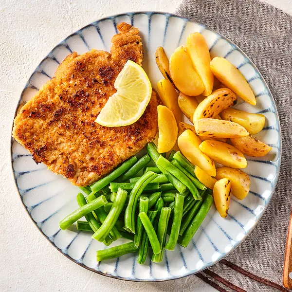 Schnitzels met aardappeltjes en boontjes