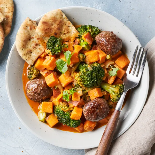 Curry met zoete aardappel en gehaktballetjes