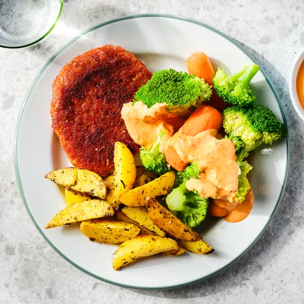 Gehaktschnitzels met groenten en aardappel