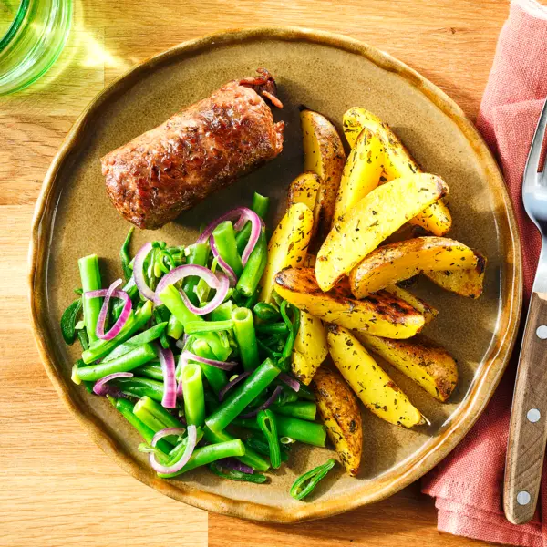 Rundervink met knoflook-citroenboontjes