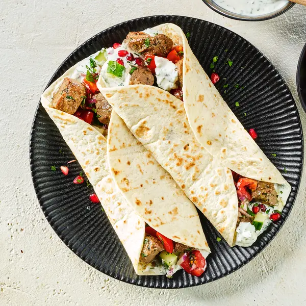 Wraps met lamsvlees en kruidenyoghurt