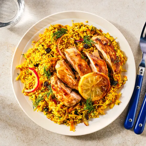 Kerrie couscous met citroen-kip en krenten