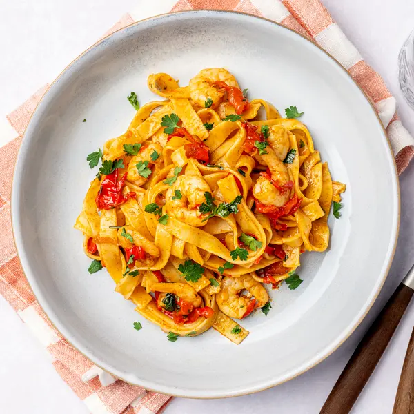 Piri-piri garnalen met tagliatelle