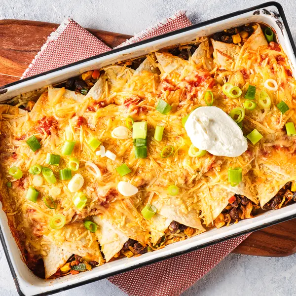 Enchilada's met zwarte bonen en zure room